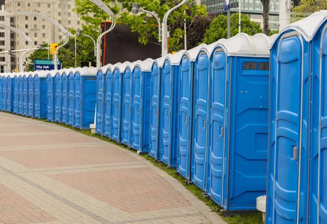 a row of portable restrooms at a fairground, offering visitors a clean and hassle-free experience in brentwood